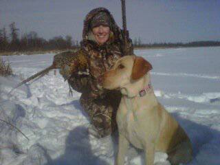 hunter with bird and dog